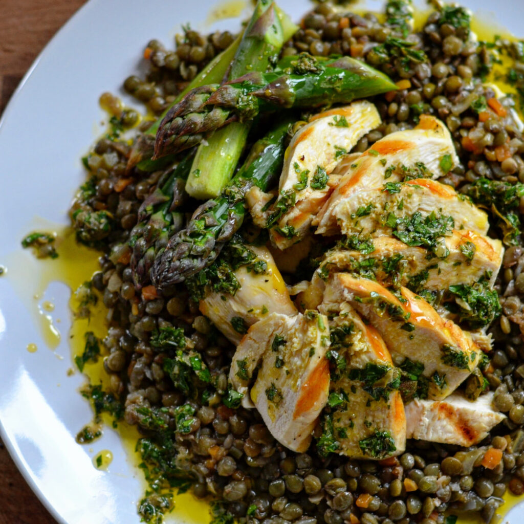 Grilled Chicken Breast with Wild Garlic Green Sauce, Lentils and Asparagus